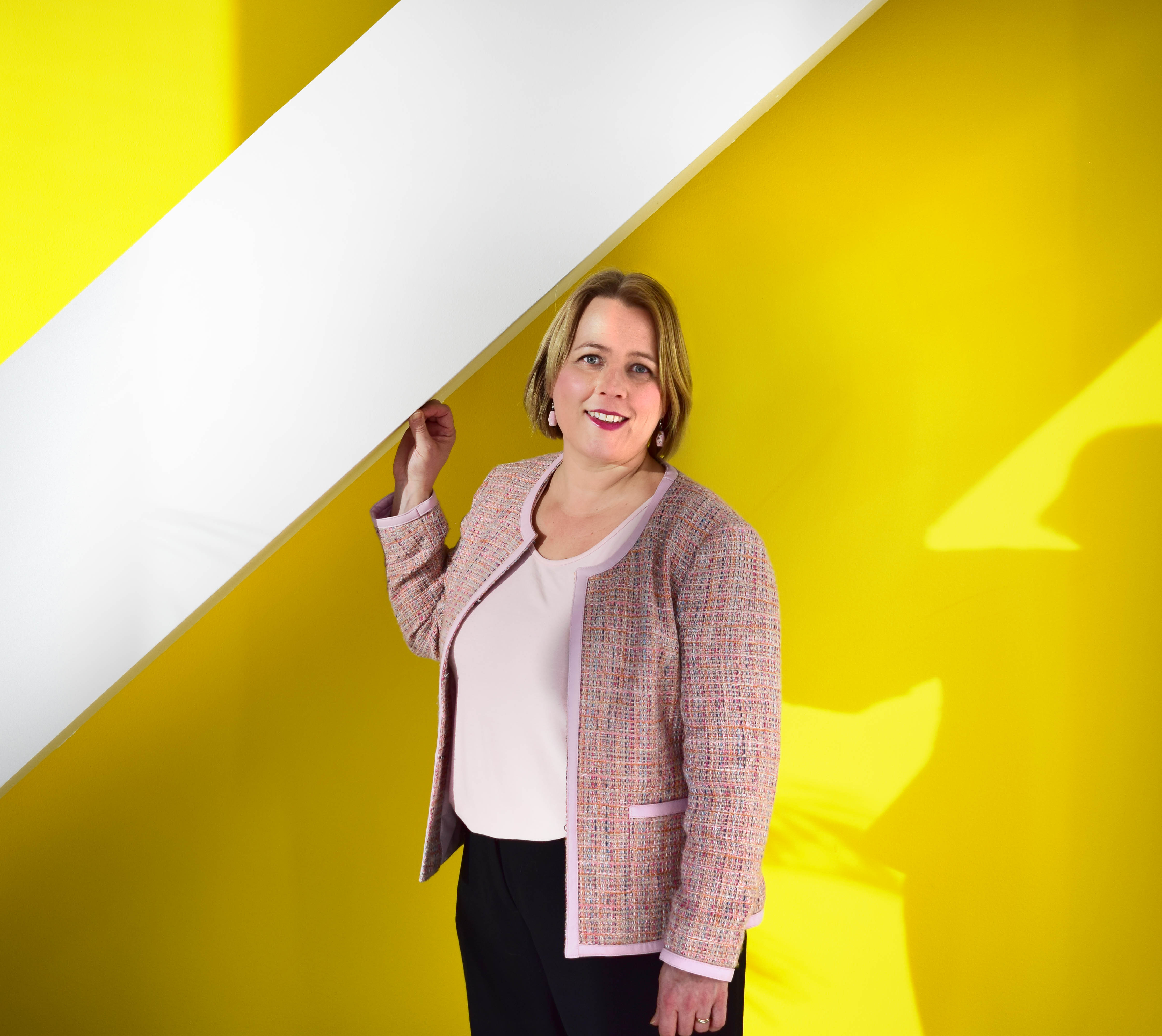 woman standing smiling