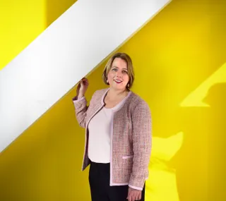 woman standing smiling